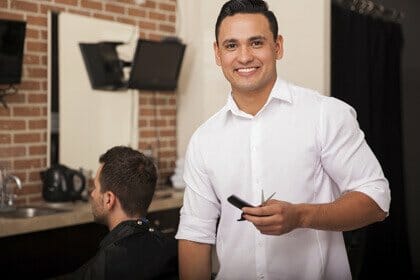 Barber cutting hair